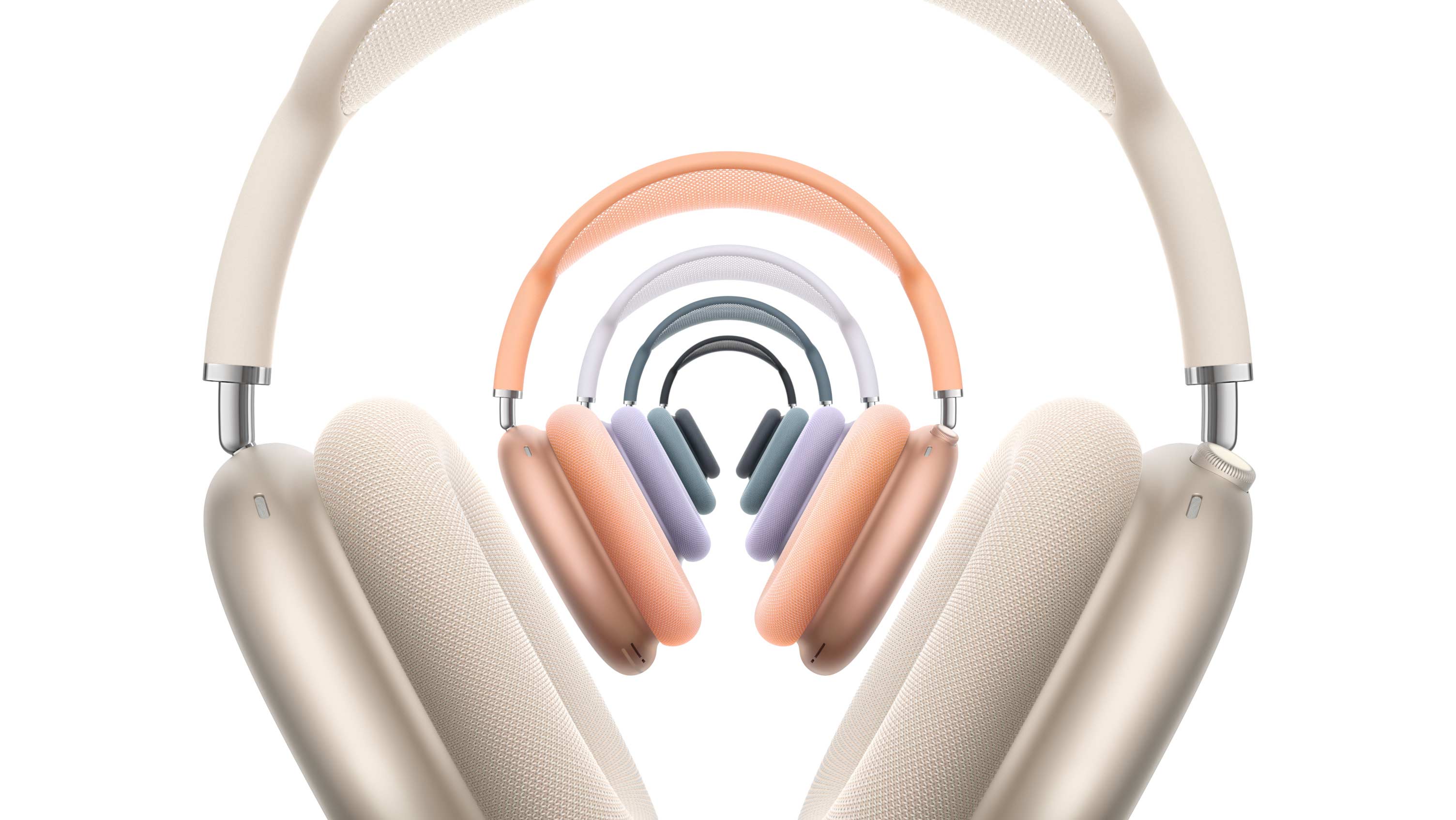 Different colored AirPods Max's, - Midnight, Starlight, Blue, Purple and Orange.