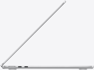 Parte lateral de un MacBook Air, abierto, color plata