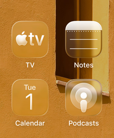 Close up of the new tinted app icons, featuring the Apple TV app, Notes, Calendar, and Podcasts